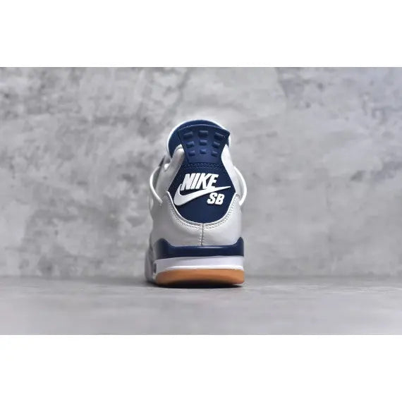 Nike SB x Air Jordan 4 Retro "Navy" — White / Navy / Red